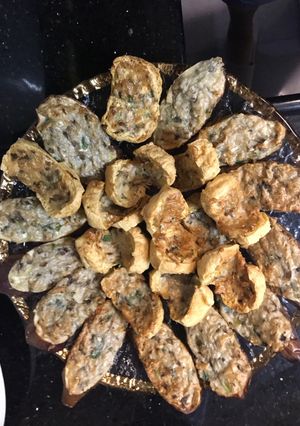 A picture of Stuffed meat fish eggplant and tofu.