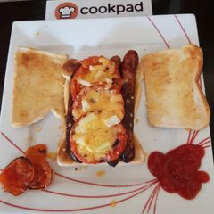 A picture of My Sausage, Tomato, Cheese + Onion Toast. 😁.