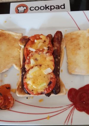 A picture of My Sausage, Tomato, Cheese + Onion Toast. 😁.