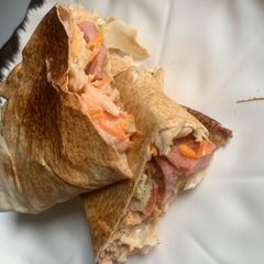 A picture of Sausage and egg shawarma.