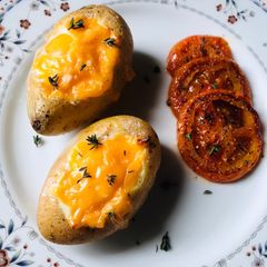 A picture of Breakfast Baked Potatoes 🥔 🍳 🧀.