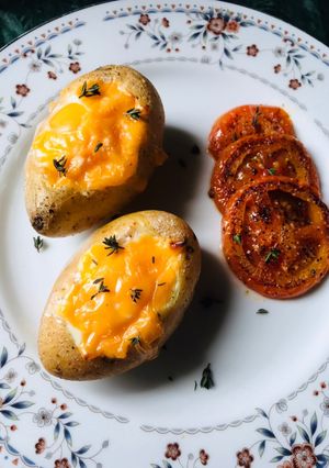 A picture of Breakfast Baked Potatoes 🥔 🍳 🧀.