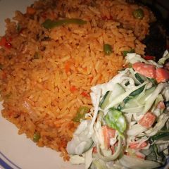 A picture of Veggies rice with veggies salad.
