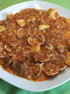 Una foto de Arroz caldoso con almejas y chocos