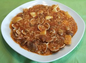 Foto principal de Arroz caldoso con almejas y chocos