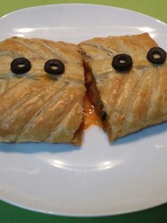 Una foto de Trenza de hojaldre con fritada y langostinos 
