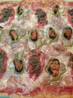 Una foto de Pizza hojaldre marinera