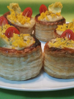 Una foto de Volovanes de ricotta y bechamel gratinados