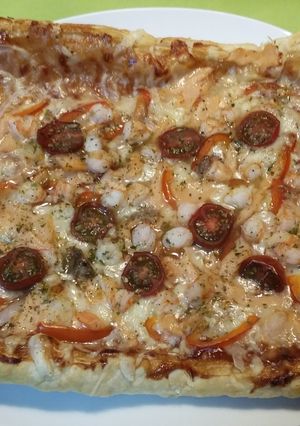 Una foto de Hojaldre de salmón y gambas