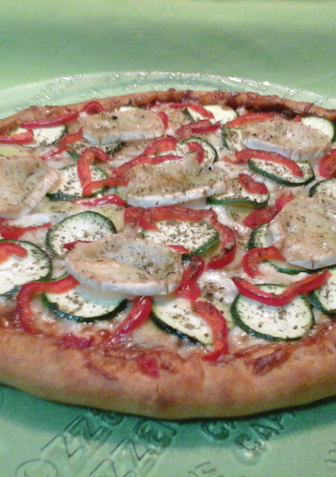 Una foto de Pizza vegetal con queso de cabra