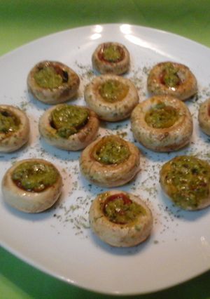 Una foto de Champiñones al pesto