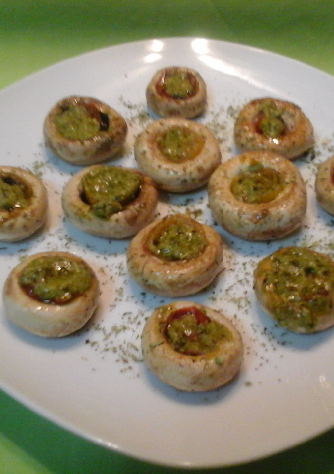 Una foto de Champiñones al pesto