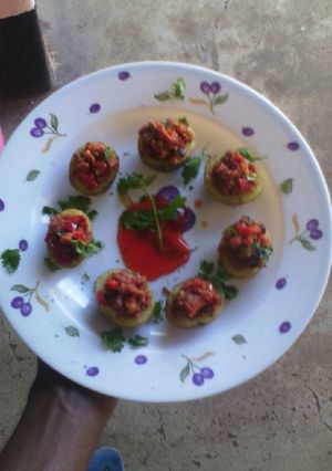 A picture of Sausage stuffed potatoes.