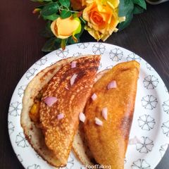 A picture of Dosa with Aloo Masala.