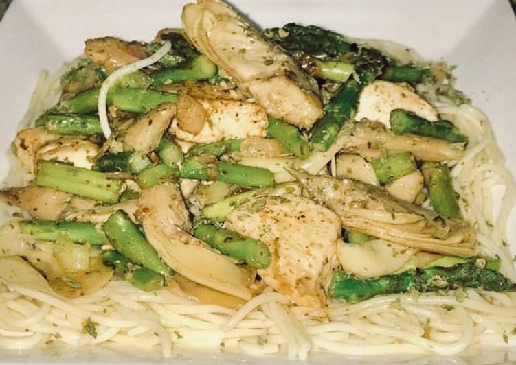 Recipe of Perfect Jerusalem chicken, grilled artichoke hearts, Asparagus on top of angel hair pasta