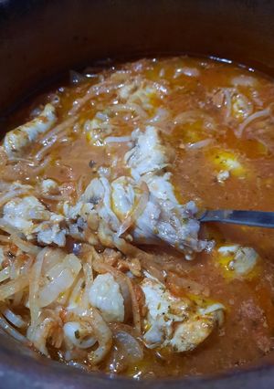 Una foto de Pollo con aceite de Dende