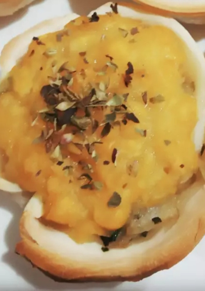 Una foto de Canastitas de choclo y queso