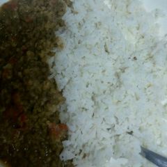 A picture of Greengram stew served with rice.