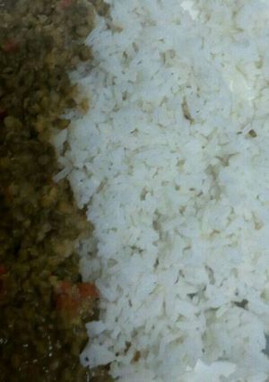 A picture of Greengram stew served with rice.