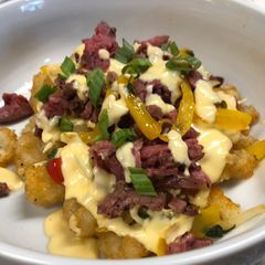 A picture of Cheesesteak Totchos.