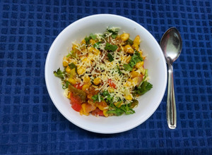 A picture of Masala Cheese Corn Chaat.