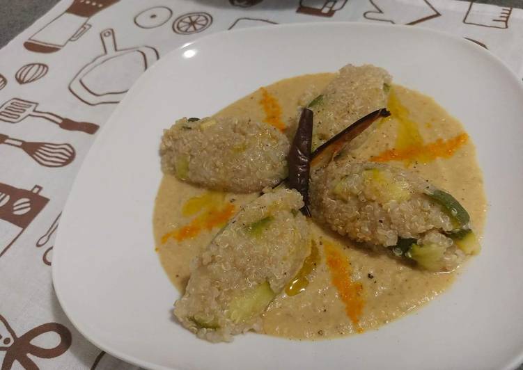 Quinoa con zucchine su crema di melanzane e curcuma