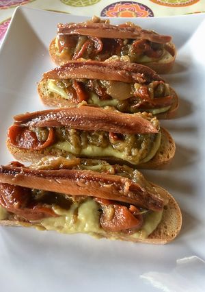 A picture of Guacamole, Escalivada, and Sardine Toasts.
