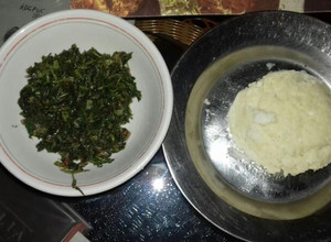 A picture of Ugali with fried amaranth(terere).