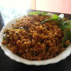 A picture of Scrambled eggs with coconut.