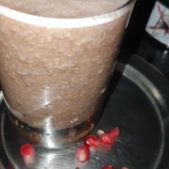 A picture of Pomegranate juice with jaggery.