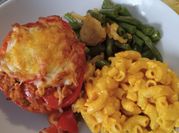 A picture of stuffed peppers rice mushrooms