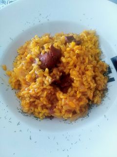 Una foto de Risotto con calamares en salsa americana