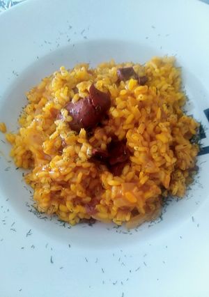Una foto de Risotto con calamares en salsa americana