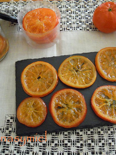 Una foto de Naranjas y mandarinas confitadas