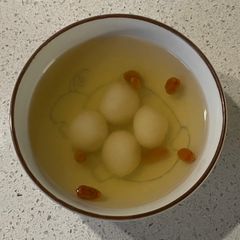 Glutinous rice balls in ginger syrup A picture of Glutinous rice balls in ginger syrup.