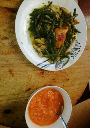 A picture of Chicken Breast with Beans and Carrot, Cucumber, and Orange Salad.