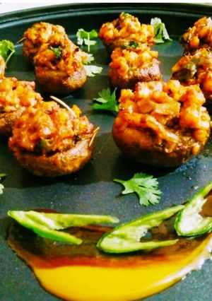 A picture of Saucy shrimp stuffed mushrooms.