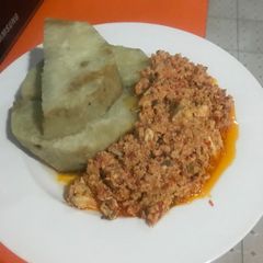 A picture of Boiled Yam and Egg Sauce.