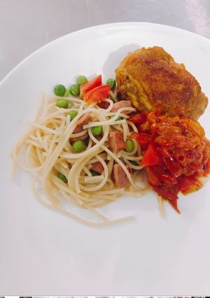 A picture of Pasta with chicken curry.
