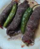 Bistec marinados en pulque rellenos de pimientos de colores y queso de saca con serrano para fiesta