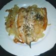 Dorada al horno con cebolla y pimientos