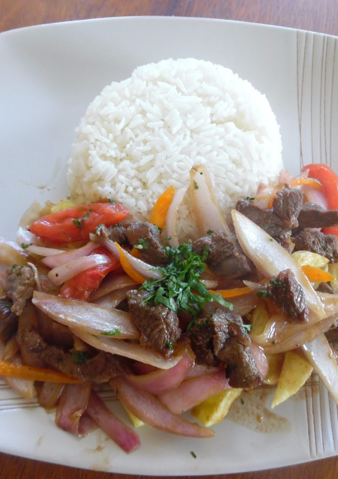 Una foto de Lomo saltado| Estilo James Salaz