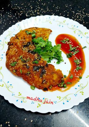 A picture of Handvo (Gujarati Savory Lentil Cake).