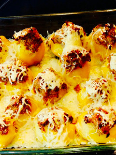 Una foto de Patatas confitadas rellenas de carne