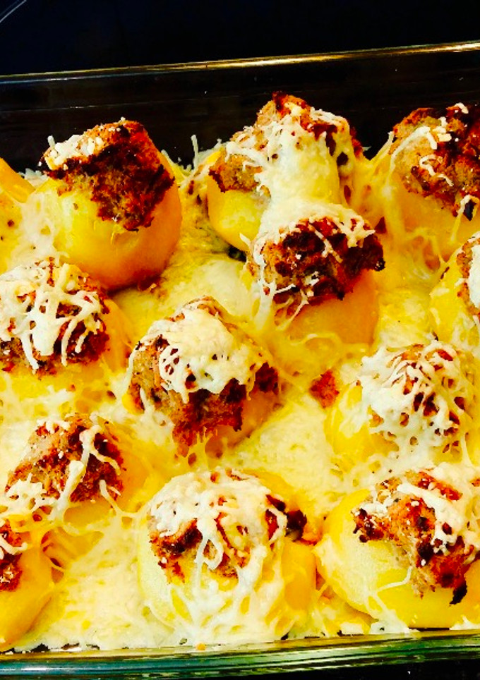 Una foto de Patatas confitadas rellenas de carne