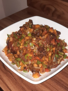 A picture of Pepper chicken with veggies.