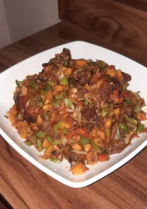A picture of Pepper chicken with veggies.