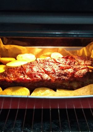 Foto principal de Costillar al horno con guarnición de patatas