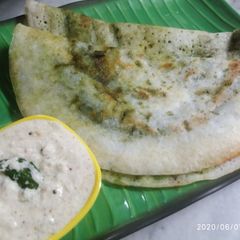 Palak butter dosa A picture of Palak butter dosa.