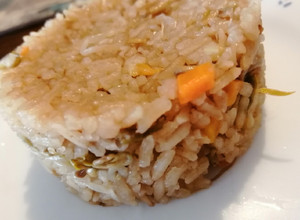 Una foto de Arroz con Coca-Cola mi versión con un toque oriental